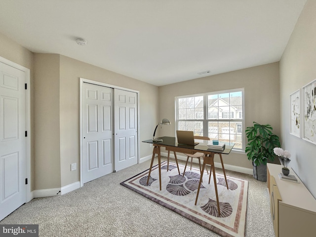 view of carpeted office space