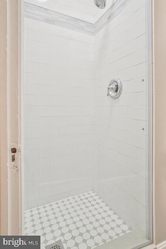 bathroom featuring an enclosed shower