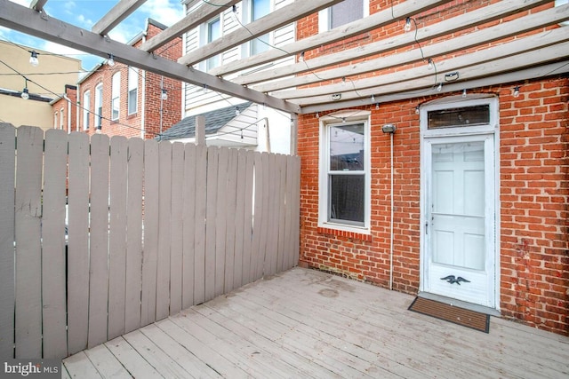 wooden deck with a pergola