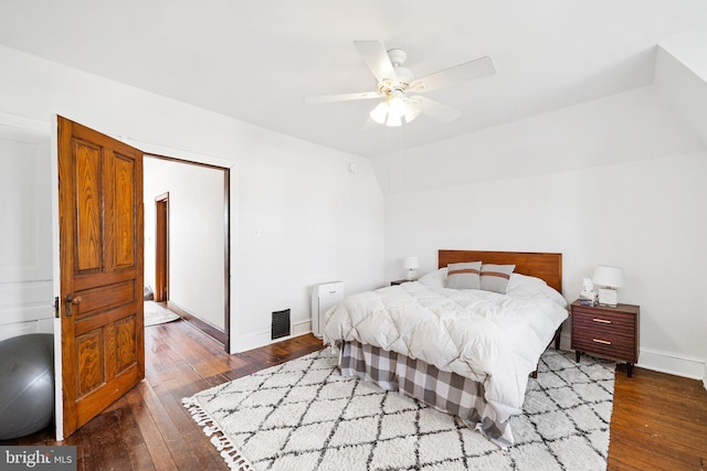 bedroom featuring dark hardwood / wood-style floors and ceiling fan