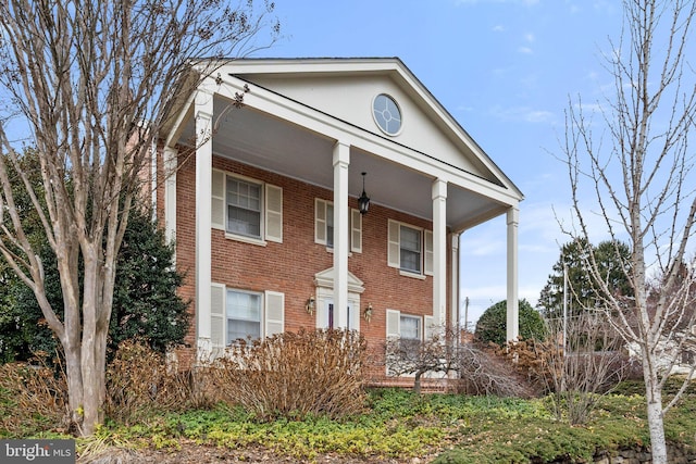 greek revival house with covered porch