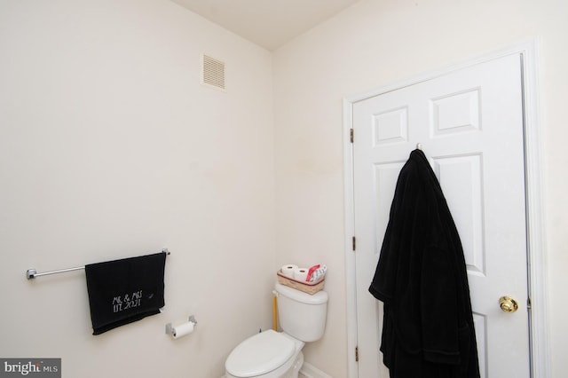 bathroom featuring toilet