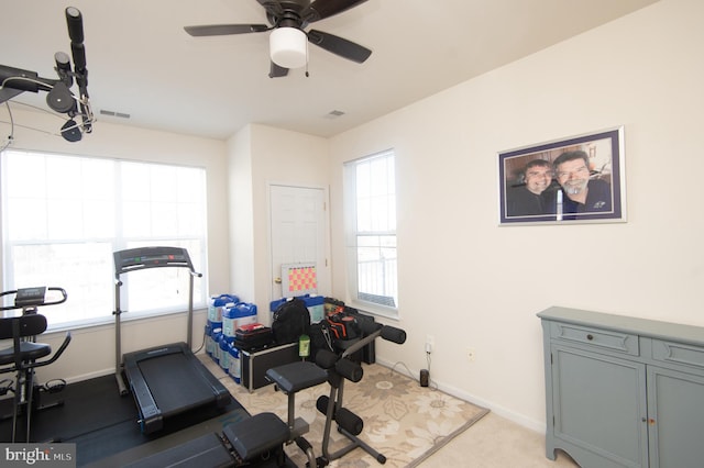 workout room featuring ceiling fan