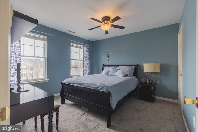 bedroom with ceiling fan and light colored carpet