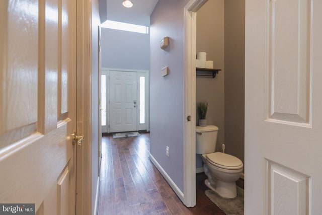 bathroom featuring toilet and hardwood / wood-style floors