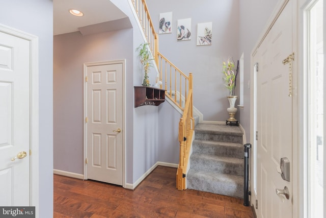 foyer featuring dark hardwood / wood-style floors