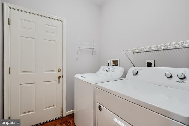 34 Broadbridge Rd, Rosedale, MD 21237 - laundry area with separate washer and dryer and dark wood-style flooring