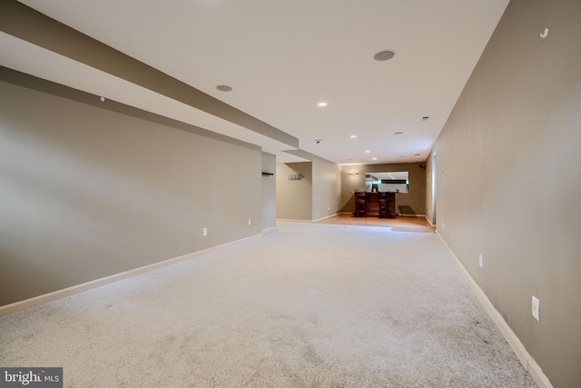 34 Broadbridge Rd, Rosedale, MD 21237 - unfurnished living room with carpet flooring, bar, and recessed lighting