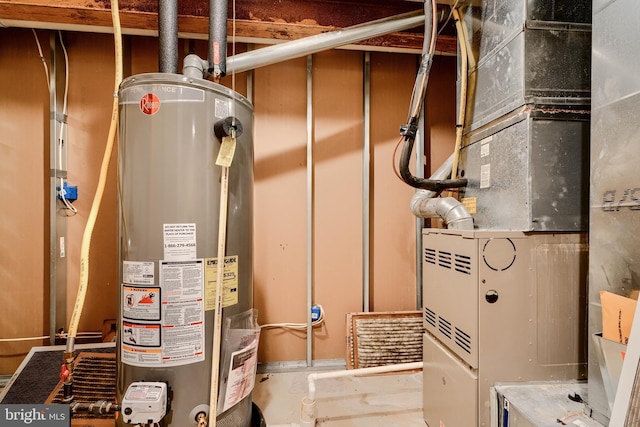 34 Broadbridge Rd, Rosedale, MD 21237 - utility room featuring water heater and heating unit