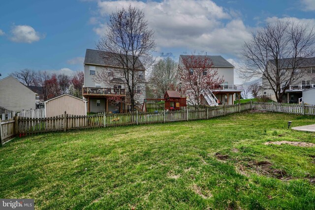 34 Broadbridge Rd, Rosedale, MD 21237 - fenced backyard featuring a playground