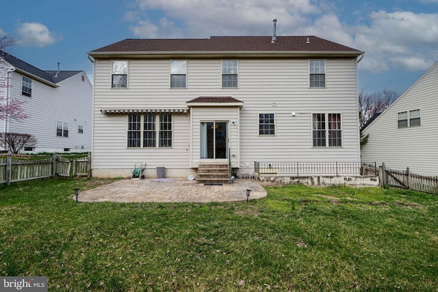34 Broadbridge Rd, Rosedale, MD 21237 - rear view of property featuring entry steps, a patio area, and a fenced backyard