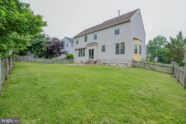 34 Broadbridge Rd, Rosedale, MD 21237 - rear view of property featuring entry steps and a fenced backyard