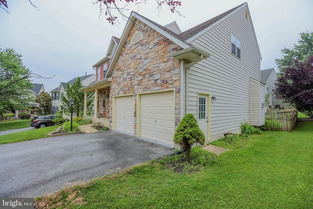 34 Broadbridge Rd, Rosedale, MD 21237 - view of side of property with stone siding and driveway
