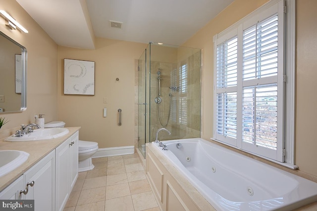 full bathroom with visible vents, a stall shower, a sink, a jetted tub, and baseboards