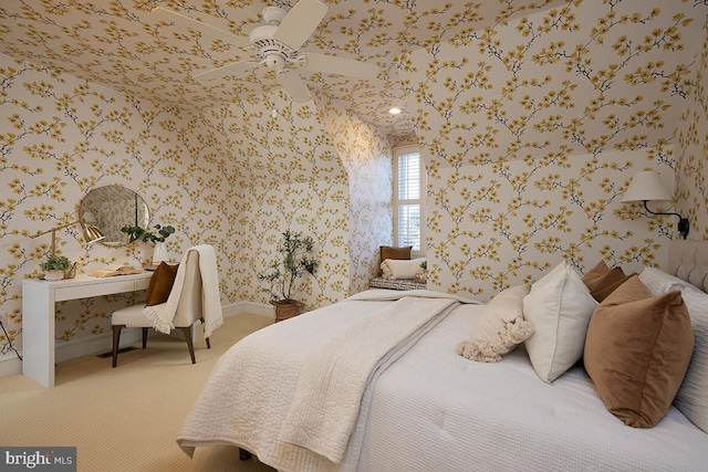 bedroom with carpet and wallpapered walls