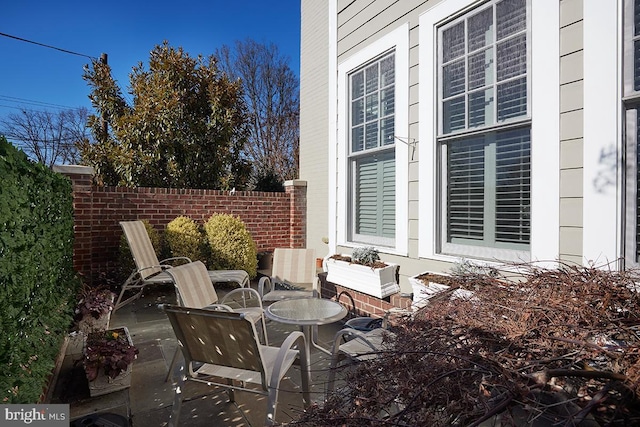 view of patio with fence