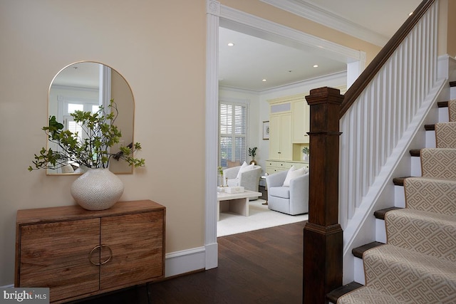 interior space featuring recessed lighting, crown molding, baseboards, and wood finished floors