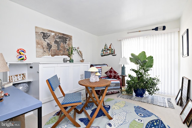 dining area featuring carpet floors