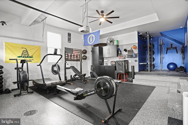 workout area with a garage