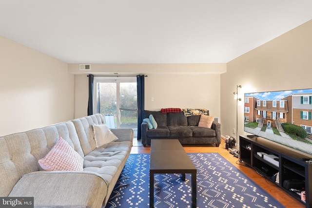 living room with hardwood / wood-style flooring