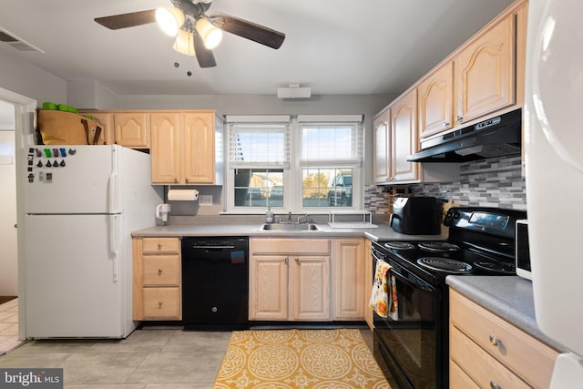 kitchen with light tile patterned floors, light brown cabinetry, sink, and black appliances