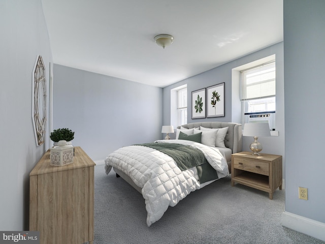 bedroom featuring cooling unit and carpet floors