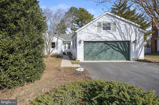 front of property featuring a garage