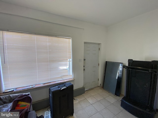 interior space with light tile patterned floors