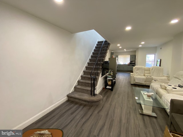 living room featuring dark hardwood / wood-style floors