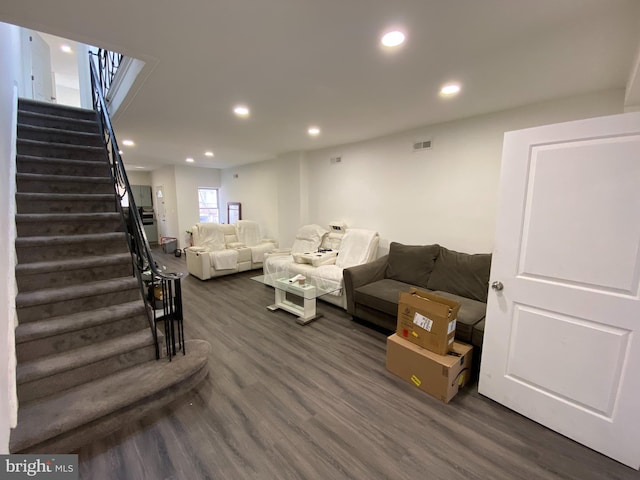 living room featuring dark hardwood / wood-style floors