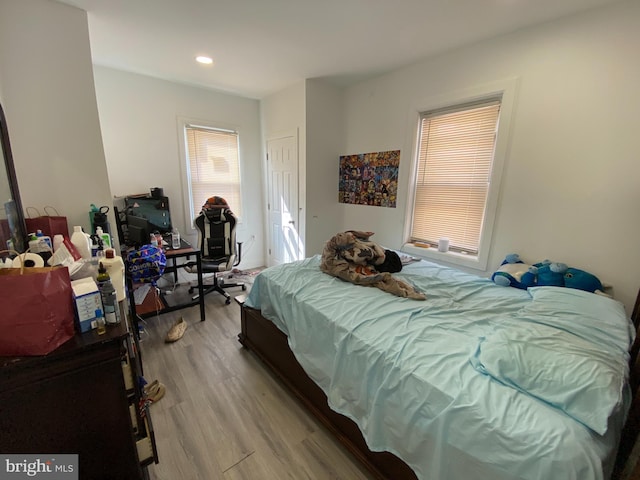 bedroom featuring light wood-type flooring