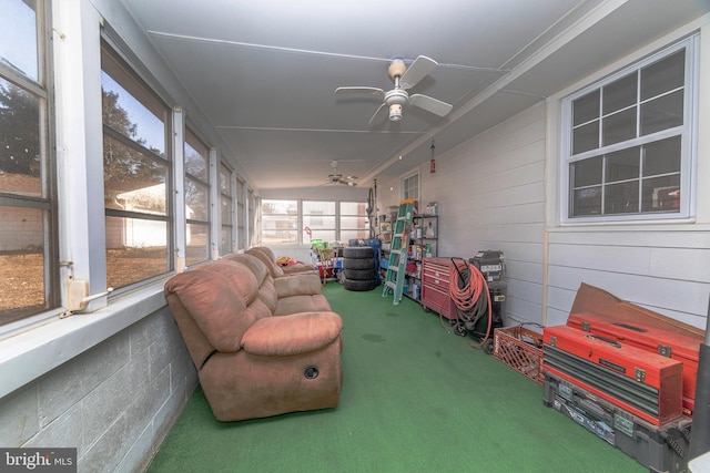 sunroom / solarium with ceiling fan