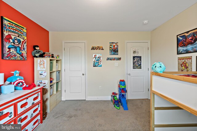 playroom with light colored carpet