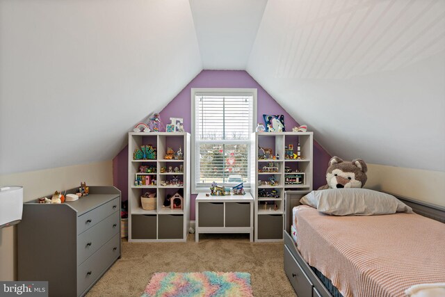 bedroom featuring lofted ceiling and light colored carpet