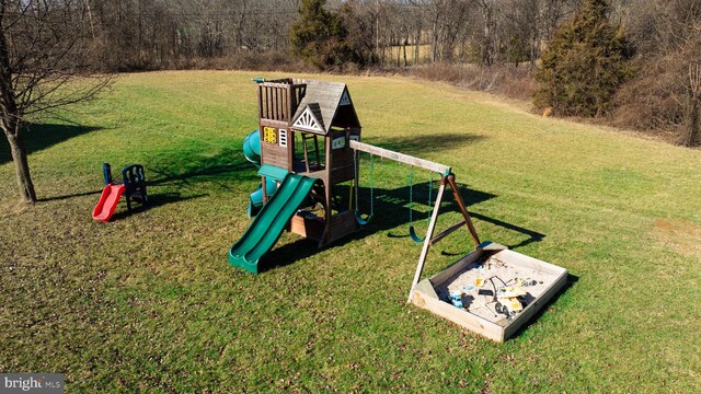 view of play area featuring a yard