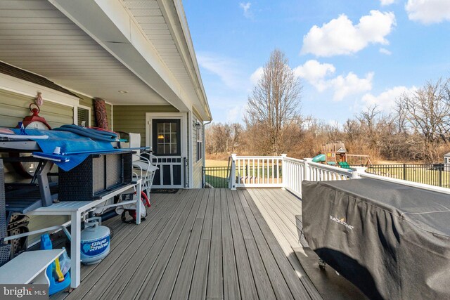 deck with a playground