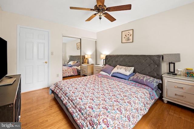 bedroom featuring a closet, ceiling fan, and light hardwood / wood-style flooring