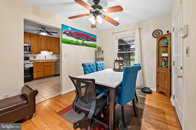 dining room featuring light wood-type flooring