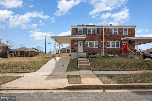 view of front facade with a front lawn