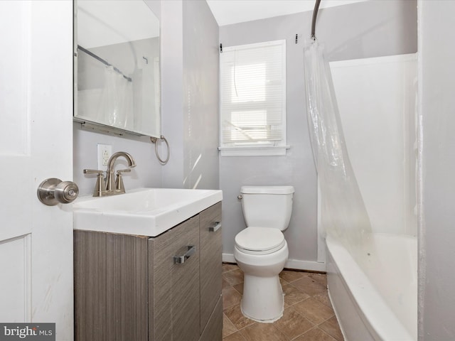 full bathroom with tile patterned flooring, vanity, shower / bath combo with shower curtain, and toilet