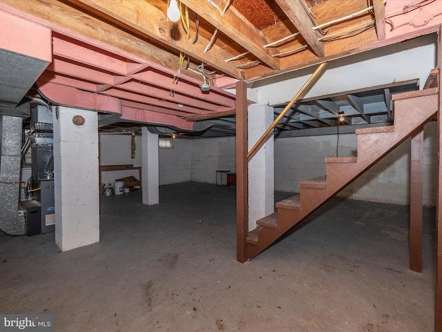 basement featuring heating unit