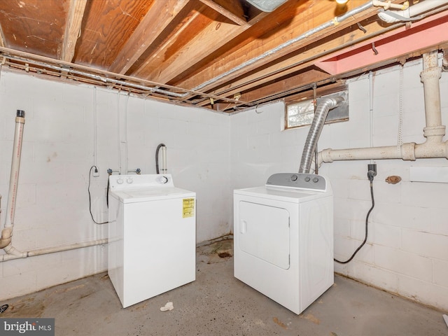 laundry room featuring separate washer and dryer