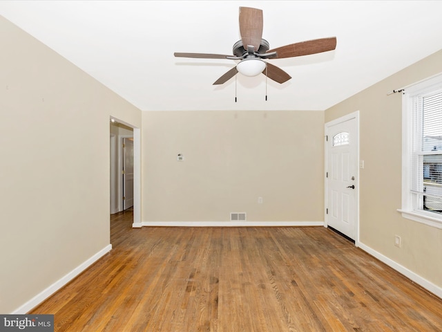 interior space featuring ceiling fan and light wood-type flooring