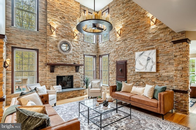 19 Longwood Ln, Newark, DE 19711 - living room with a towering ceiling, wood finished floors, and a fireplace