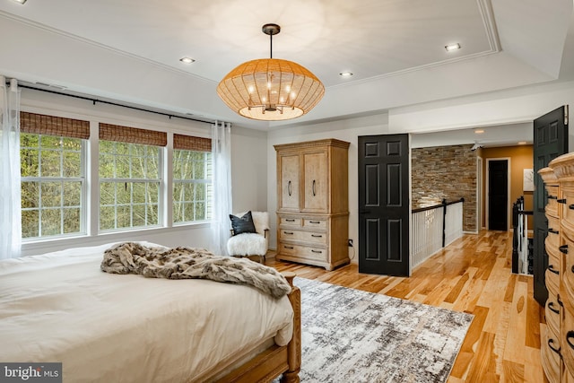 19 Longwood Ln, Newark, DE 19711 - bedroom featuring a chandelier and light wood-style flooring
