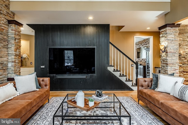 19 Longwood Ln, Newark, DE 19711 - living room featuring recessed lighting, decorative columns, stairs, and wood finished floors