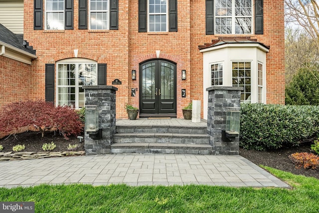 19 Longwood Ln, Newark, DE 19711 - doorway to property featuring french doors and brick siding