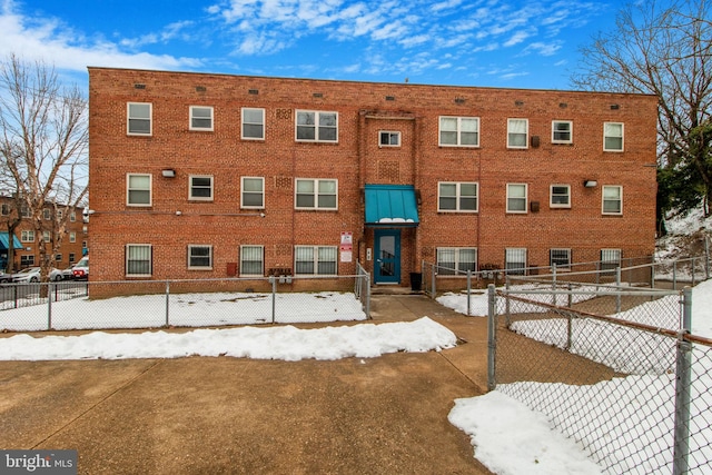 view of snow covered property