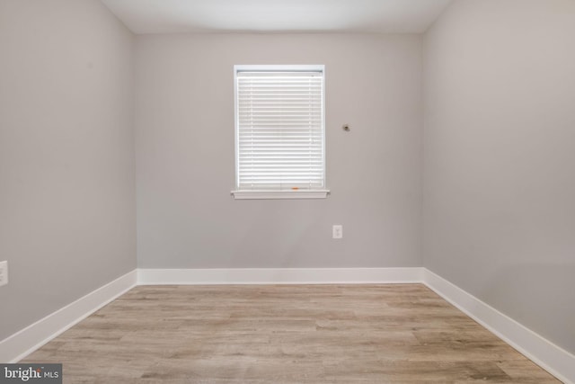 unfurnished room featuring light hardwood / wood-style floors