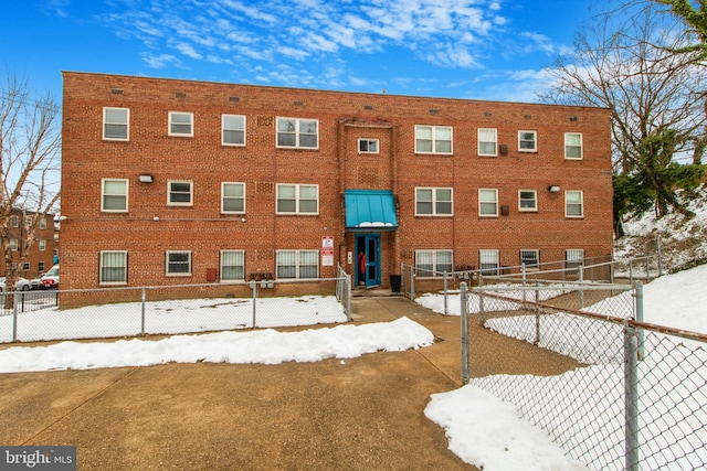 view of snow covered property